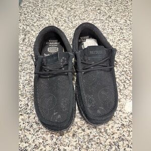 Jelly Roll Hey Dude Men’s Black Casual Moc Slip-On with Subtle Pattern